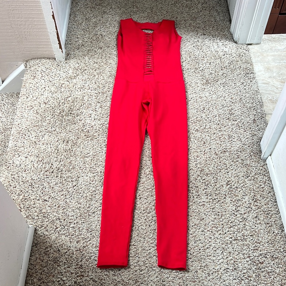 Mika body suit. Open back slit front.bright red size M